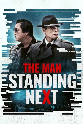 The Man Standing Next